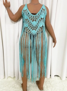 Detailed back view of light blue crochet beach cover-up with hollow patterns and long fringes
