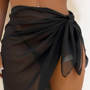 Detail of sheer black chiffon sarong showing side tie-waist and lightweight texture