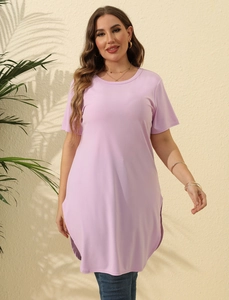 Detail view of light purple plus size T-shirt dress with side slits and curved hemline