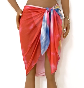 Colorful tie-dye beach sarong wrap skirt made of lightweight sheer mesh fabric with tie closure