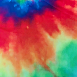 Colorful tie-dye round beach towel with vibrant gradient watercolor print for picnic