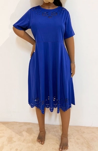 Detailed view of the dark blue short-sleeve dress with laser-cut hollow floral patterns