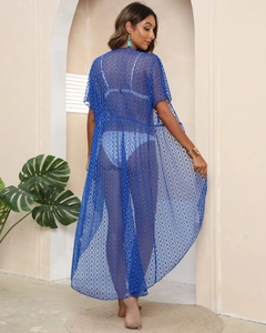 Detailed back view of a blue lace crochet beach cover-up with intricate sheer floral patterns