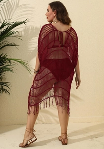 Burgundy crochet bikini cover-up dress with hollow texture and fringe tassels on a model