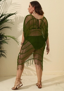 Detailed knit of dark green crochet beach cover-up with long tassels and vertical cutouts