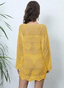 Rear view of a yellow long sleeve crochet beach cover up dress with hollow out design