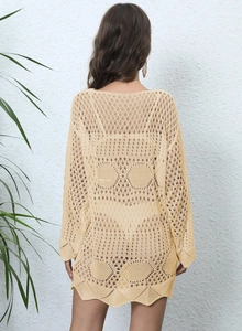 Detailed back view of a beige crochet hollow cover-up dress with intricate knit patterns