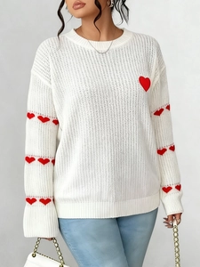 Plus size white knit sweater with red heart jacquard and color-blocked loose fit style