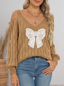 Lace bow cable knit sweater in warm ginger color featuring V-neck and cold shoulder design