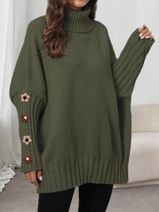 Deep green oversized turtleneck sweater with crochet flower details on long sleeves