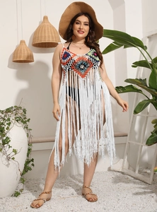 White crochet beach cover-up dress with colorful geometric patterns and long tassels