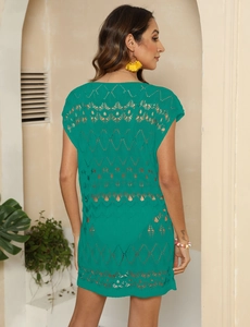 Detailed back view of emerald green crochet beach cover-up with hollow knit diamond pattern