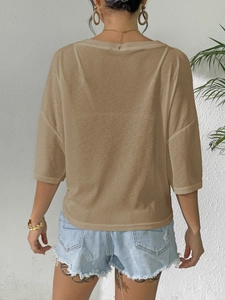 Women's loose-fit brown short sleeve T-shirt with drop shoulders and round neckline