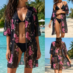 Detail of floral print mesh bikini cover-up with roses and wide batwing sleeves