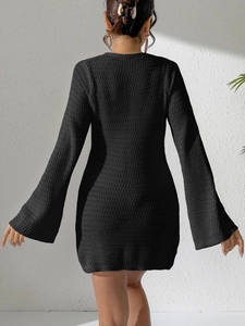 Sexy black deep V crochet mini beach dress with flare sleeves, back view on model