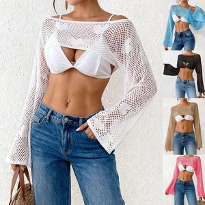 Detail view of heart-patterned crochet knit bolero shrug with flared sleeves in five colors