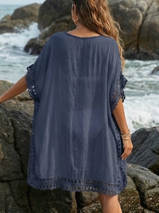 Navy blue crochet beach cover up with lace trim and loose bohemian style for women