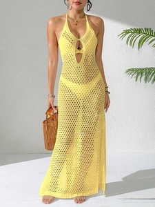 Detailed knit pattern of a yellow V-neck crochet beach dress with side slit design