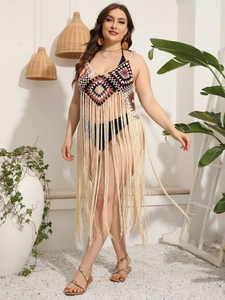 Bohemian crochet beach cover-up dress with colorful geometric patterns and long tassels