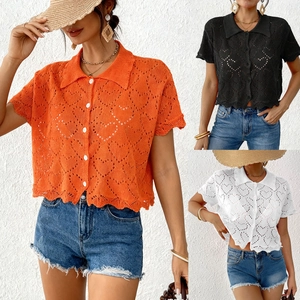Detail of crochet knit short sleeve shirts with heart patterns and button-down collar