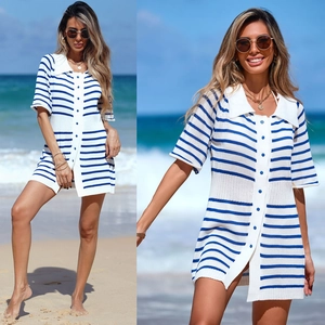 Detail of blue and white striped knit cover-up with nautical collar and buttons