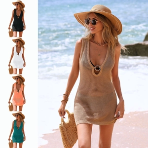 Detailed knit hollow-out beach cover-up featuring deep V-neck and metal ring decoration