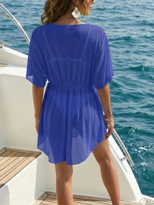 Detail view of the royal blue mesh cover-up featuring a high-waist design and sheer texture
