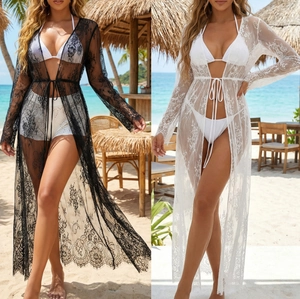 Close-up of fine floral lace texture on long sleeve V-neck beach cover-up cardigan