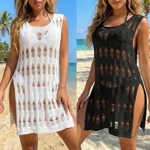 Detail of hollow knit beach cover-up with side slits in white and black styles