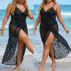 Detail of plus size black lace beach cover-up featuring intricate floral crochet patterns