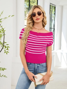 Detailed view of the rib-knit texture and white stripes on the pink off-shoulder top
