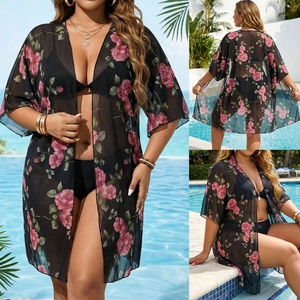 Detailed views of floral chiffon beach cover-up with rose print in pool setting