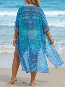 Flowing Bohemian long beach cover-up with blue animal print and side slits back view