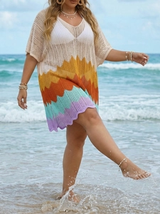 Detail of colorful wave knit pattern on a sexy hollow out beach vacation dress