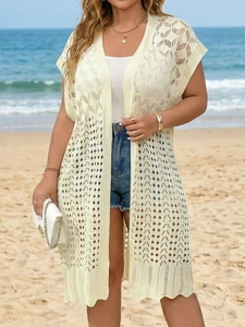 Detailed knit texture and geometric hollow design of the beige beach cardigan