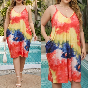 Detail view of plus size tie-dye slip dress with V-neckline and functional side pockets