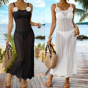 Detail of crochet floral straps and hollow mesh design on these beach maxi dresses