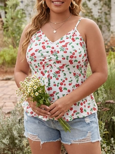 Detailed view of women's plus size cherry print camisole top with denim shorts outfit