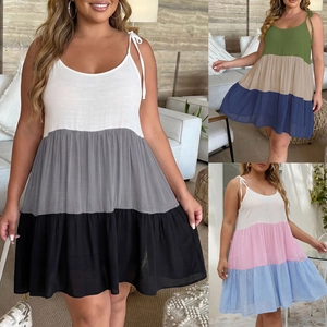 Detail of color-block patchwork and adjustable tie straps on a plus size summer dress
