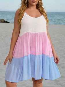 Close-up of lightweight textured fabric on a three-tier color block beach sundress