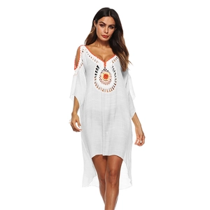 White boho crochet beach cover-up with colorful hollow embroidery for summer vacations