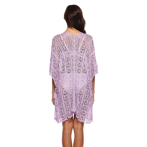Detail view of lavender hollow crochet texture and back design of summer beach cover-up