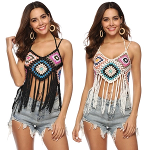 Detail of bohemian crochet halter tops featuring geometric patterns and long fringe tassels