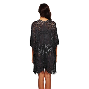 Detail view of the intricate crochet weave on the back of this black beach cover-up
