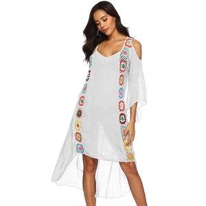 Bohemian white off-shoulder midi dress with colorful crochet floral patchwork lace accents