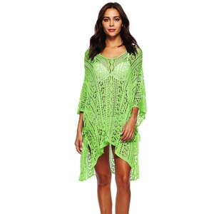 Detail of bright green crochet hollow out V-neck beach cover up with irregular hem