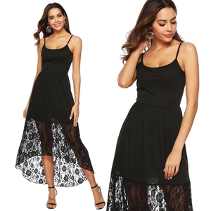 Detail of lace hem and high-low silhouette on a black bodycon camisole dress