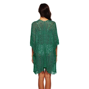 Detailed back view of a dark green crochet knit beach cover-up with hollow patterns
