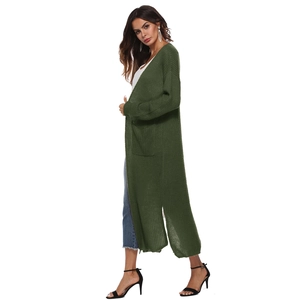 Detailed texture of army green long knit cardigan with side slits and large pockets