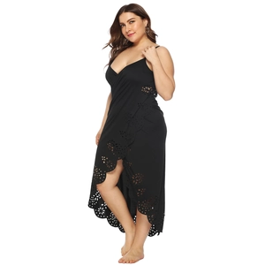 Plus size black sleeveless beach dress with laser-cut floral patterns and a V-neckline